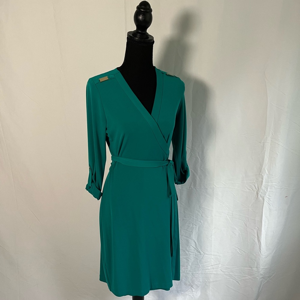Calvin Klein Turquoise wrap dress. Size 8. Very Good Condition. Stretchy
